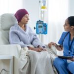 Female cancer patient consulting oncologist for breast cancer treatment in Pune