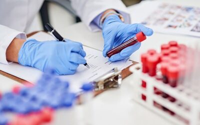 Doctor explaining liquid biopsy blood test for early cancer detection and monitoring